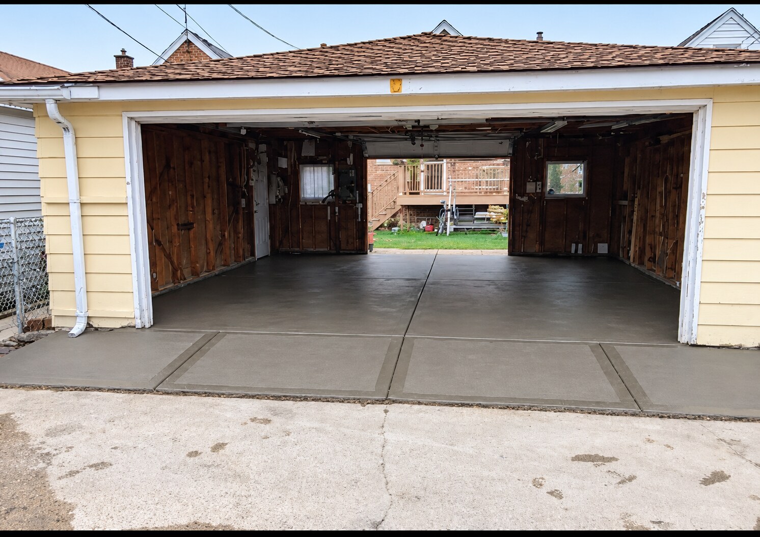 Concrete garage apron in front of a Chicago home